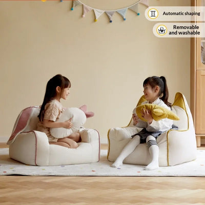 Gemütlicher Bunny Kinderlesesessel mit Karotten-Plüschkissen