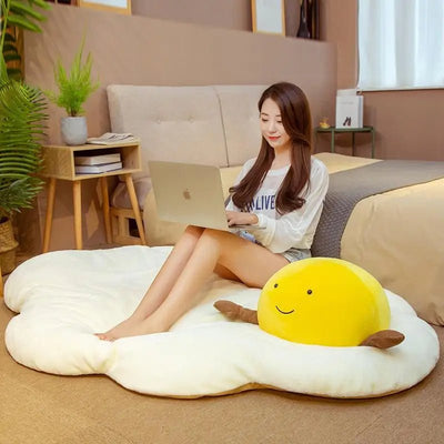 Plushie Jumbo Fried Egg Floor Cushion, 4.3-5.6' | 1.3-1.7 m plush toy – – – Image 1 | Plushie Produce
